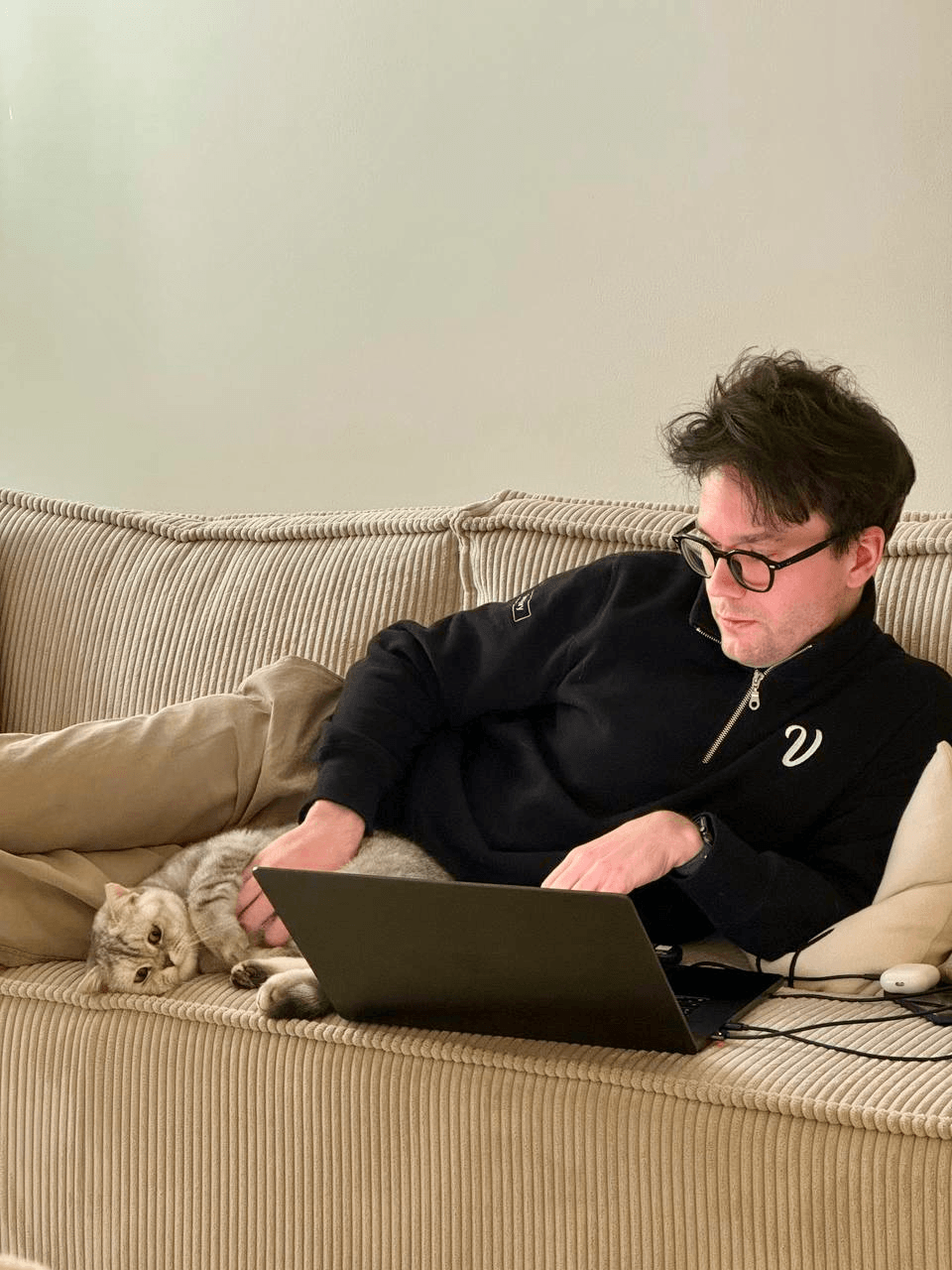 Gregory working with a cat